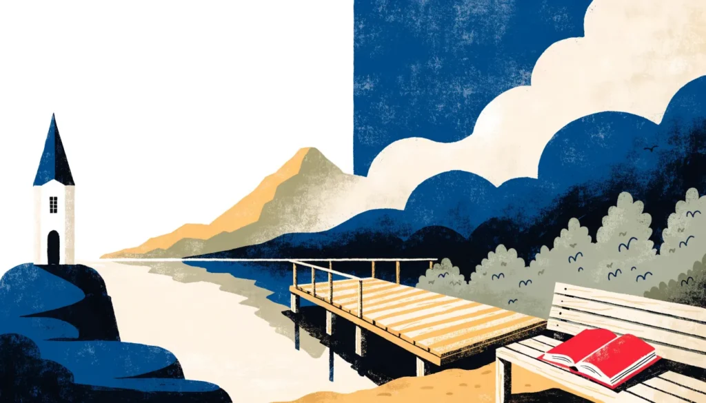 Hvit kirke ved fjorden og en åpen salmebok